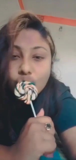 Horny Girl Licking Lollypop And Showing Boobs